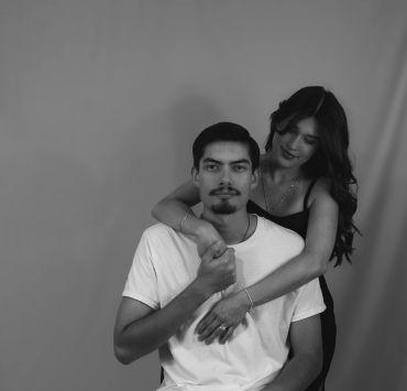 Couple in a tender embrace, black and white photo.