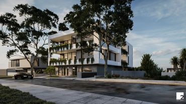 Modern eco-friendly building with greenery and sleek design on a quiet street.