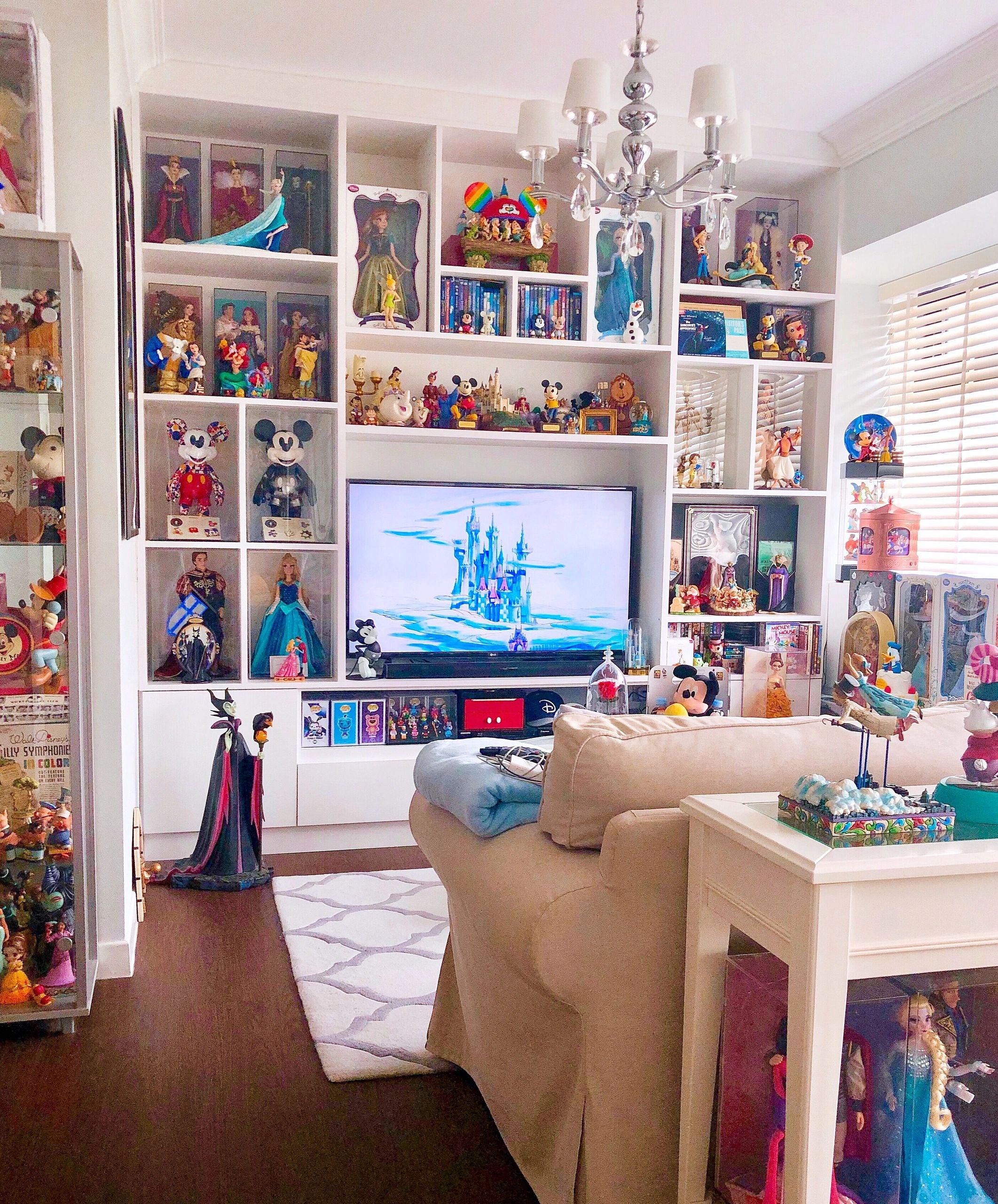 Disney themed living room full of creepy idols