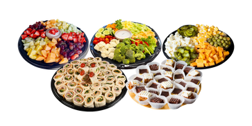 assortment of party platters with fancy rolled sandwiches