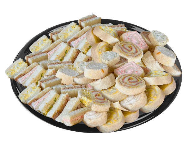 fancy finger and rolled sandwiches on a platter