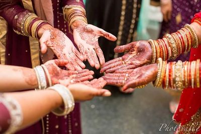 happy bride with her henna in Stoney creek