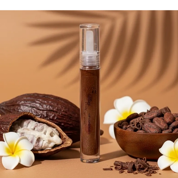 Lip gloss with cacao beans and flowers on beige background.
