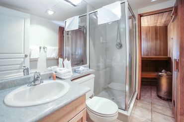 The master bathroom features a shower and dry sauna!