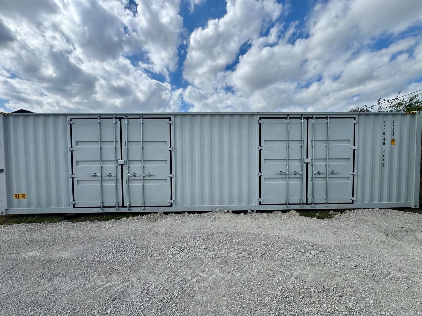 40ft storage container with side-opening doors on the gravel yard at Ultra Safe Storage, Ponder