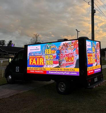 Advertising truck promoting the 77th Annual Pasco County Fair in 2024.