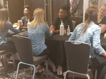 Wellness in the workplace.  Corporate wellness.  Hand massages.