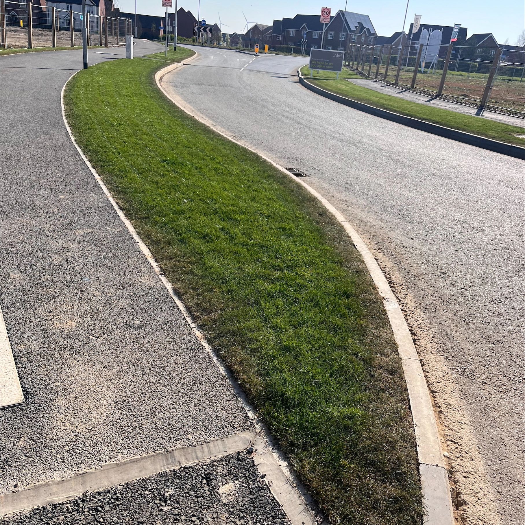 Freshly cut grass on a new build housing development in Swaffham.