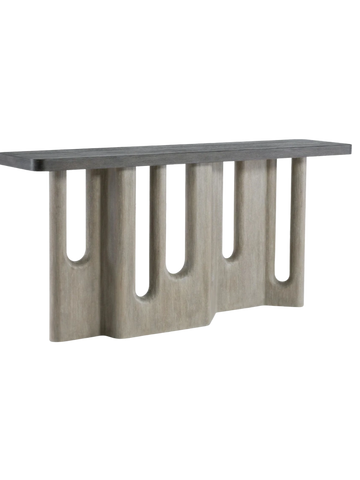 Modern concrete console table with geometric cut-out design.