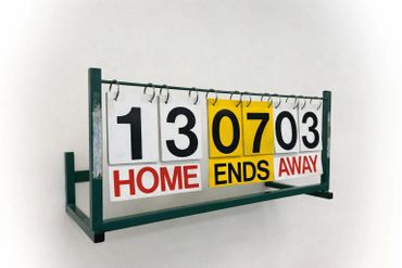 An indoor scoreboard showing the home side winning 13-3 after 7 ends.