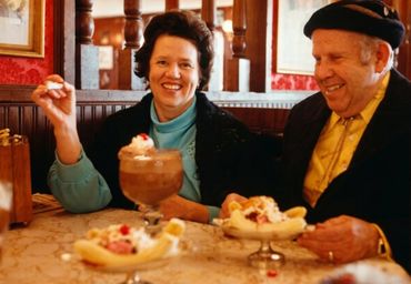 Woman smiling in a small kitchen