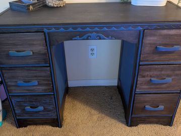 Old wood desk, taken down to bare wood and stained with a dark walnut and detailing painted with acr