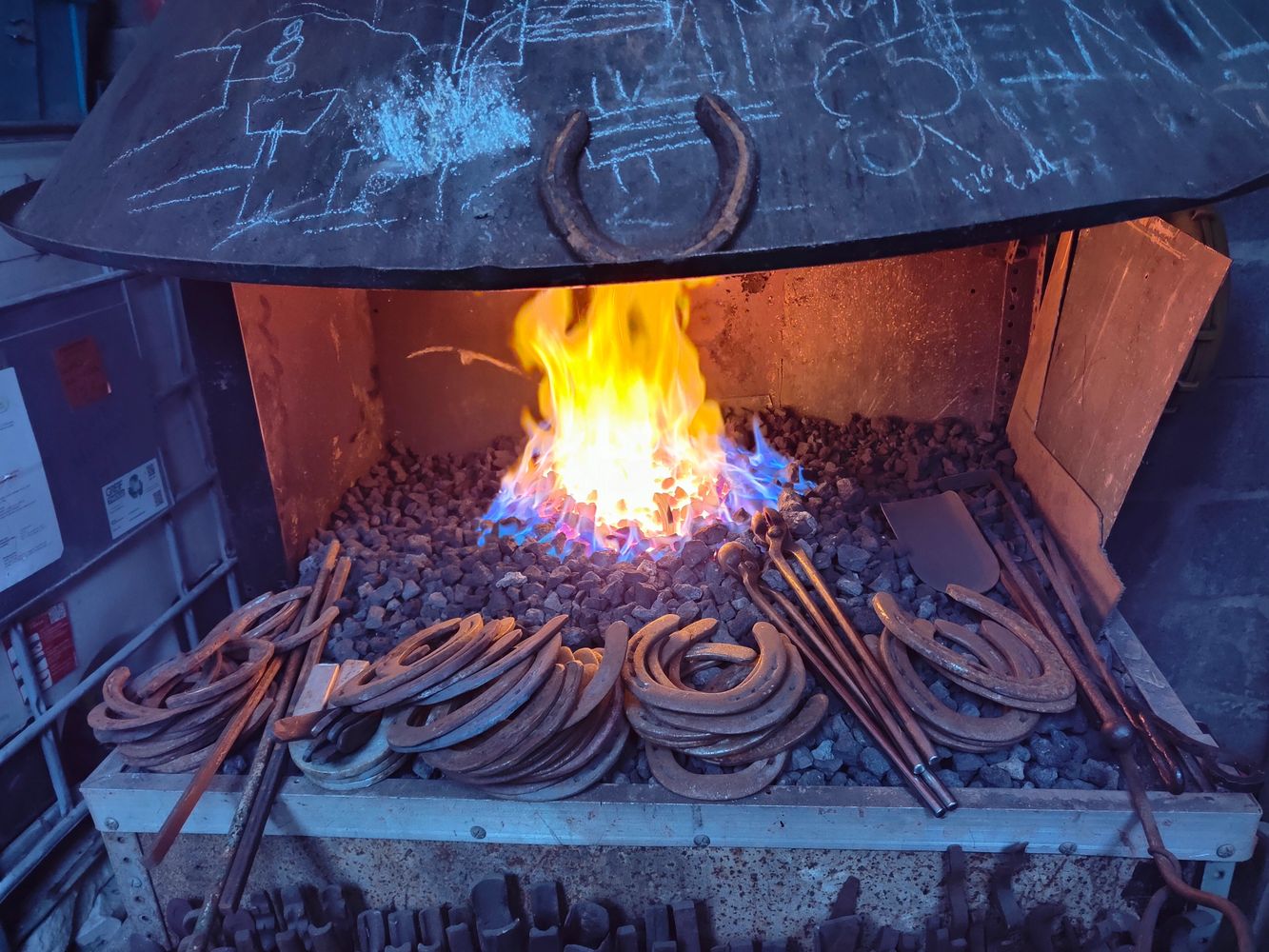 A coke fire, the heart of the smithy.