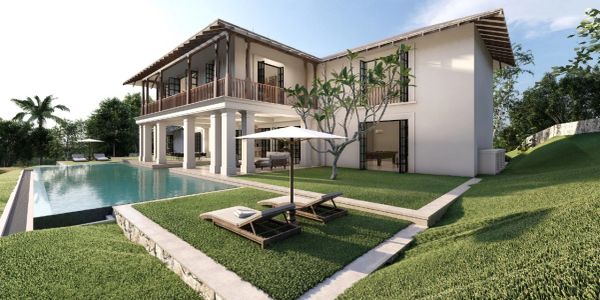 Modern two-story house with pool and outdoor lounge area.