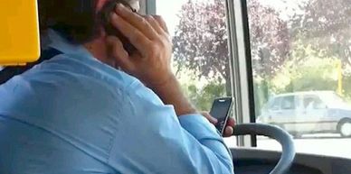Distracted Driver using 2 cell phones