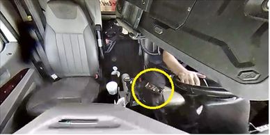 Video image of Distracted Driver blocking dashcam view