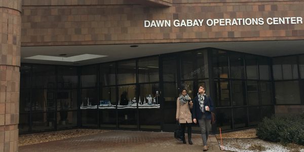 Janany Ragunathan and Matthew Lattavo outside Dawn Gabay Operations Center