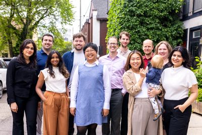 A group of smiling LTRT staffers