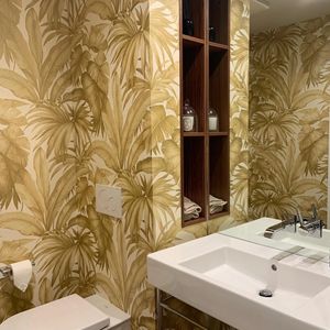 Versace Wallcovering installed by REVIVE to accentuate this powder room