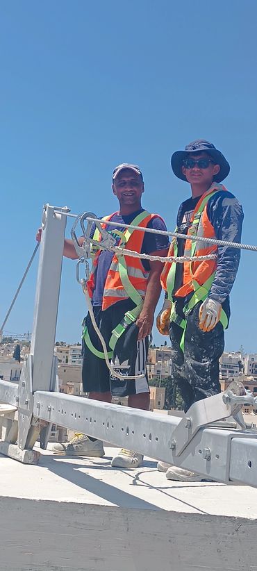 PFT team members working confidently at height, fully secured and trusting their equipments.