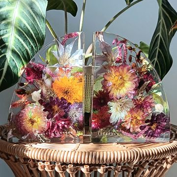 Complimentary color enhancement if needed. Flowers sealed with UV resistant epoxy resin.