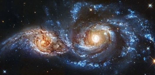 Galaxy NGC 2207 and IC 2163, two merging galaxies in the constellation Canis Major.