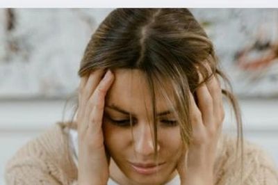 Depicts a woman frustrated with life's cares.