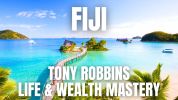 Tropical island paradise with clear blue water and Tony Robbins event text.