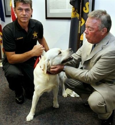 Detective Gowens and Summit County Sheriff Drew Alexander with Gowens’s K9 Labrador Retriever “Lou” 