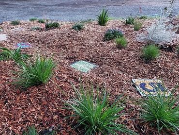 mosaic garden art in this educational landscape garden