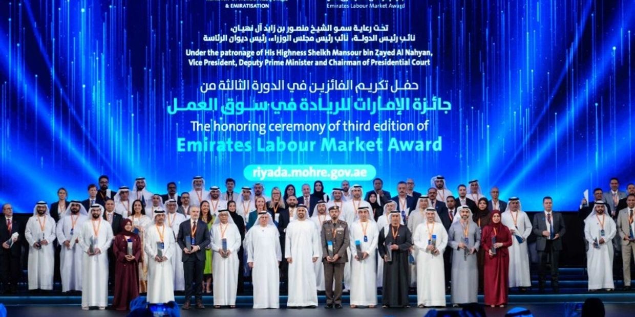 Group photo at the Emirates Labour Market Award honoring ceremony.