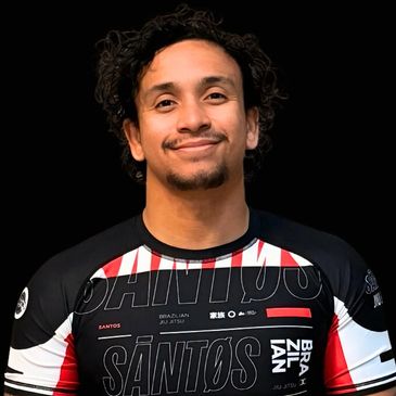 Head Instructor / Owner of Santos Brazilian Jiu Jitsu. Paul Creighton Black Belt Logan Santos.