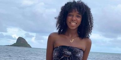 woman smiling on the beach