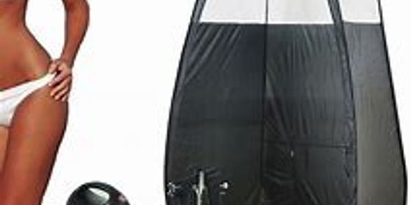 Portable spray tanning booth with equipment and a woman in white bikini.