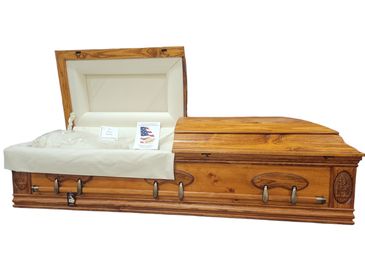 A casket with a dome top lid with a white background