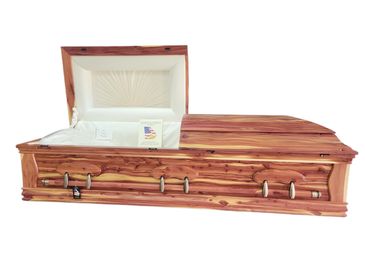 An eastern red cedar casket with a white background