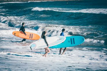 Surfers at the beach