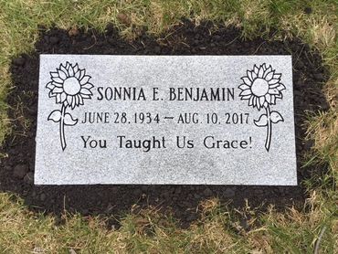 Headstone with sunflower designs-Potomac Memorials