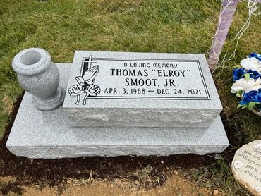 Bevel headstone on a base with a flower vase-Potomac Memorials