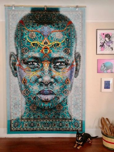 An artwork of a blue-faced girl called Fearless offered by Delegance Fine Art consultants