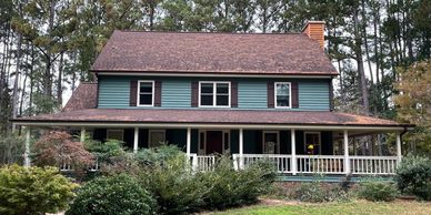 Exterior residential painting company comprehensive painting used a solid stain for this project