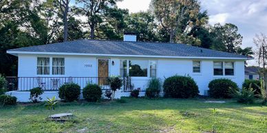 exterior residential painting company completed this brick home using Romabio