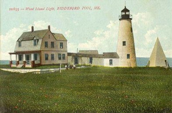 Historic Biddeford Pool lighthouse and keeper's house in Maine.