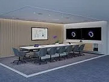 Modern conference room with sleek chairs and digital screens.