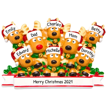 Christmas reindeer figurines labeled with family names and a holiday greeting.