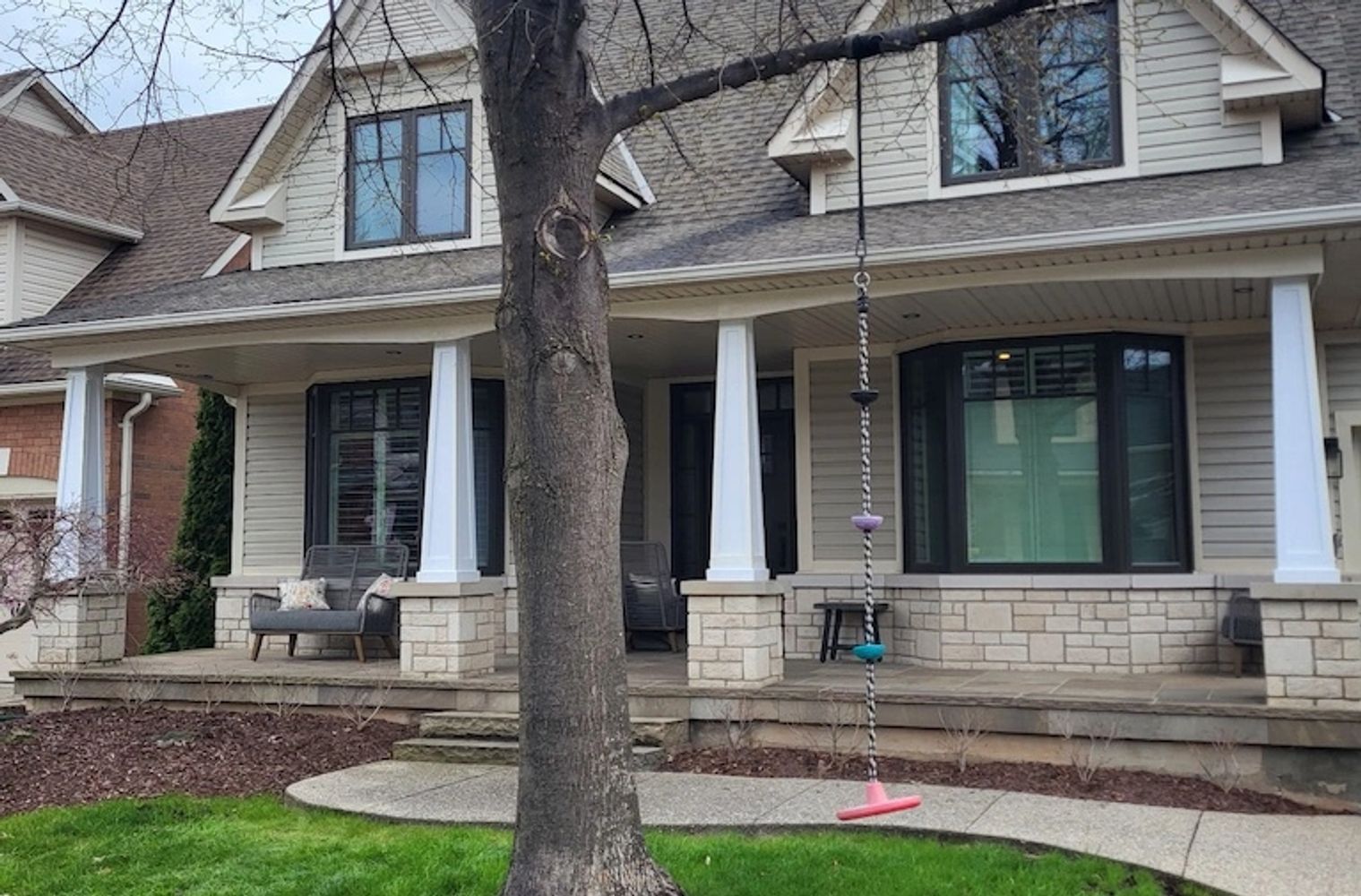 PVC Column Wraps installed on brick pedestal front porch