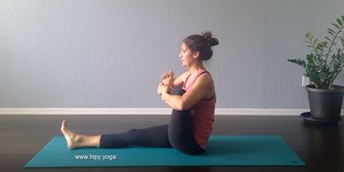 Utthita Hindolasana, seated cradle, cradle the baby