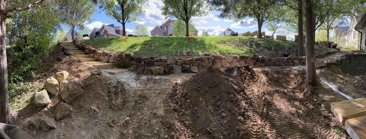 Natural stone retaining wall design and installation in Simpsonville, KY.