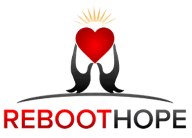 Two hands holding a red heart with a crown above it.