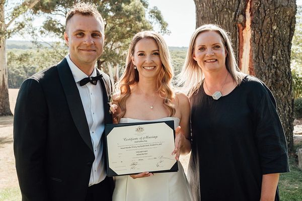 Photo of bride, groom and Celebrant after a ceremony at Mount Macedon Winery